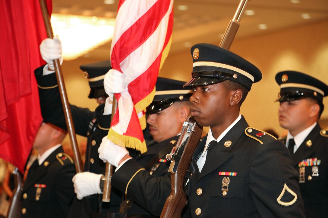 Soldiers from the 864th Engineer Battalion, stationed at Joint Base Lewis-McChord, near Tacoma, Washington, provide a ceremonial color guard for the U.S. Army Corps of Engineers, Walla Walla District, change-of-command ceremony, July 20, 2018, at the Marcus Whitman Hotel and Conference Center in downtown Walla Walla, Washington.