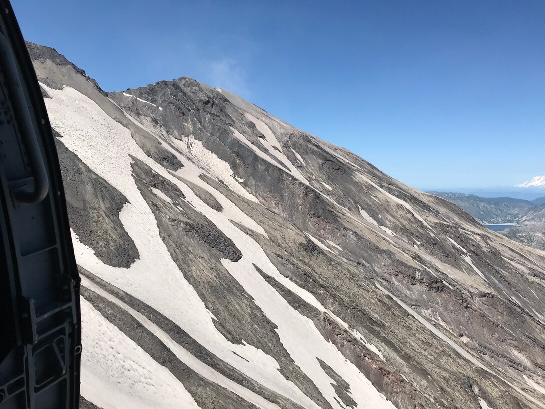 MH-60 Jayhawk helicopter medically evacuates an injured hiker