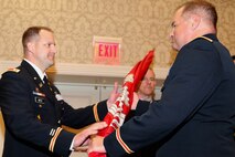 Lt. Col. Christian N. Dietz (left), Walla Walla District’s new commander, receives the Corps colors from Col. Torrey A. DiCiro (right), commander of the Corps’ Northwestern Division. Dietz assumed command of the U.S. Army Corps of Engineers, Walla Walla District, during a July 20, 2018, ceremony at the Marcus Whitman Hotel and Conference Center in downtown Walla Walla, Washington. Col. DiCiro presided over the ceremony.