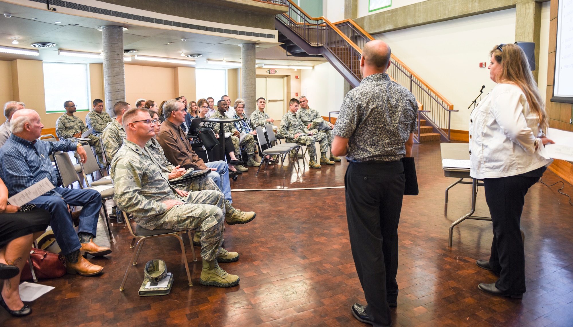 Members of the workforce development working group provide an update to military and civilian leaders during the quarterly partnership meeting held at the San Angelo Museum of Fine Arts, San Angelo, Texas, July 19, 2018. Topics addressed included better awareness and advertising for jobs on base and within the community (U.S. Air Force photo by Aryn Lockhart/Released)