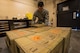 Senior Airman Myles Wolf, 23d Maintenance Squadron (MXS) munitions inspector, grabs a crate of munitions prior to an inspection, July 10, 2018, at Moody Air Force Base, Ga. Munitions inspectors enhance Moody’s combat capabilities by inspecting and approving safe and serviceable ammo. (U.S. Air Force photo by Airman 1st Class Eugene Oliver)