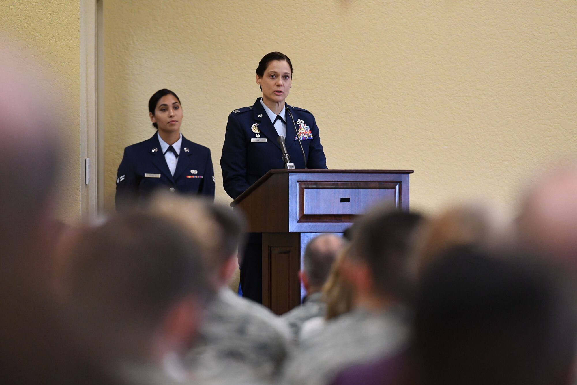 U.S. Air Force Col. Marcia Quigley, 81st Mission Support Group commander, delivers remarks during the 81st MSG change of command ceremony in the Bay Breeze Event Center at Keesler Air Force Base, Mississippi, July 19, 2018. Quigley assumed command from Col. Danny Davis, outgoing 81st MSG commander. (U.S. Air Force photo by Kemberly Groue)