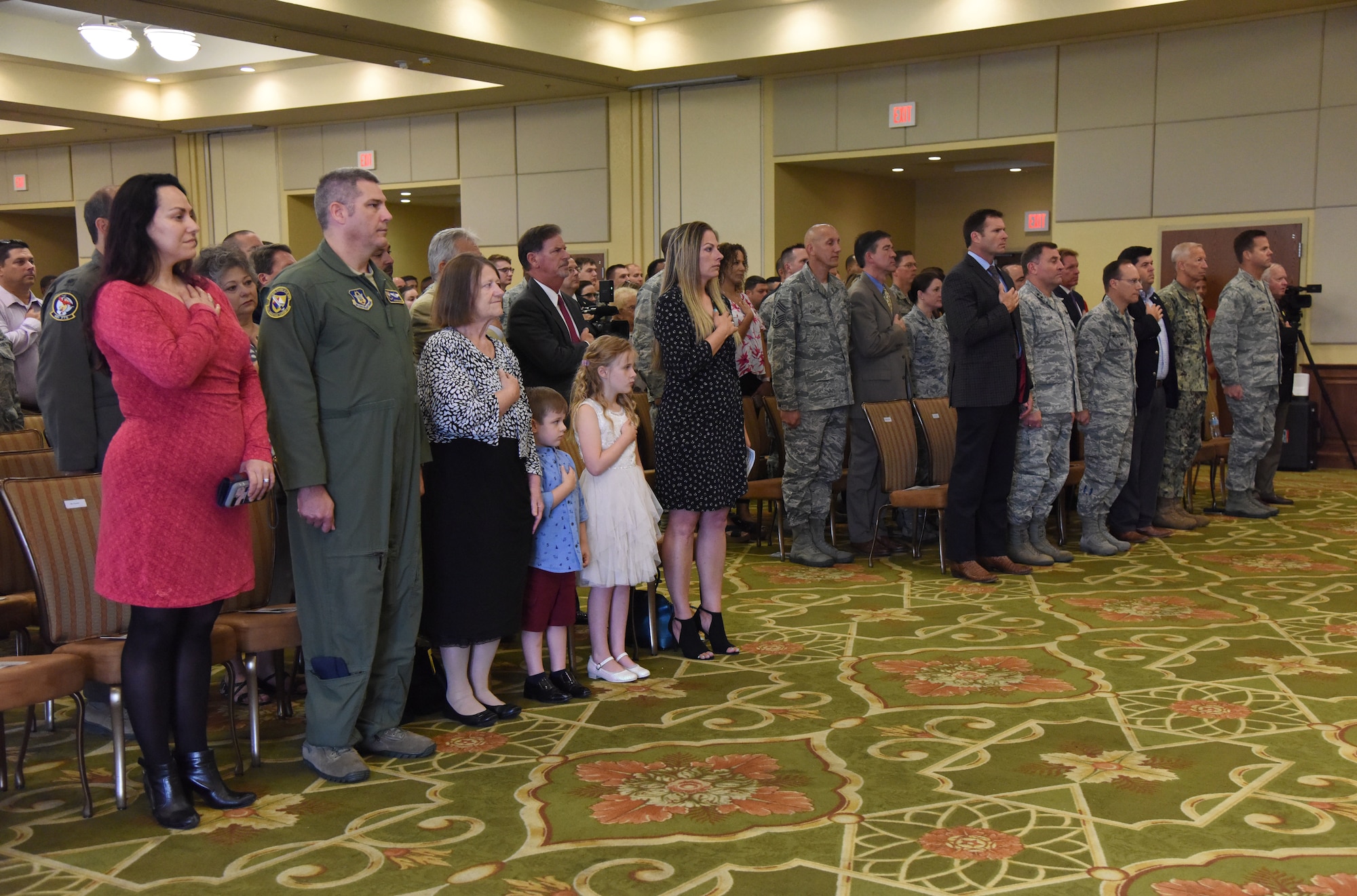 Keesler personnel, families and friends attend the 81st Mission Support Group change of command ceremony in the Bay Breeze Event Center at Keesler Air Force Base, Mississippi, July 19, 2018. U.S. Air Force Col. Marcia Quigley, incoming 81st MSG commander, assumed command from Col. Danny Davis, outgoing 81st MSG commander, with the passing of the guidon. The passing of the guidon is a ceremonial symbol of exchanging command from one commander to another. (U.S. Air Force photo by Kemberly Groue)