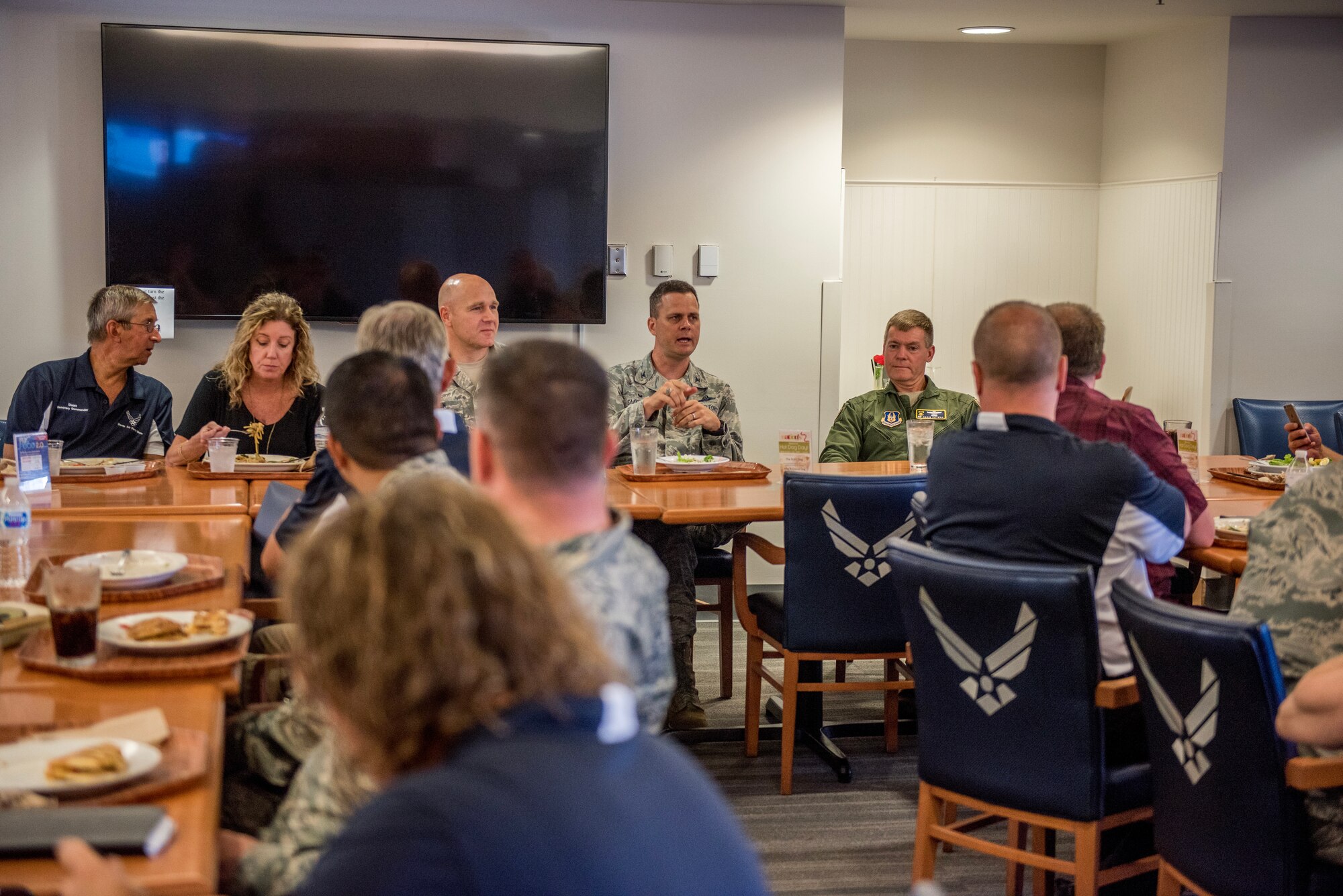 Cols. Joel Safranek, 436th Airlift Wing commander, and Craig Peters, 512th Airlift Wing commander, thank the honorary commanders during a luncheon at Dover Air Force Base, Del., July 19, 2018. Honorary commanders had lunch as they conversed with the wing commanders about Dover Air Force Base's mission during a round-table discussion. (U.S. Air Force photo by Staff Sgt. Damien Taylor)