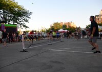 A team of Airmen from the 28th Civil Engineer Squadron volunteered their time to help set up for Summer Nights in downtown Rapid City, S.D., July 19, 2018. The Airmen moved tables and trash cans to the downtown area, while another group completed the set up. Summer Nights is a free event which takes place every Thursday night during the summer, providing live music and entertainment.