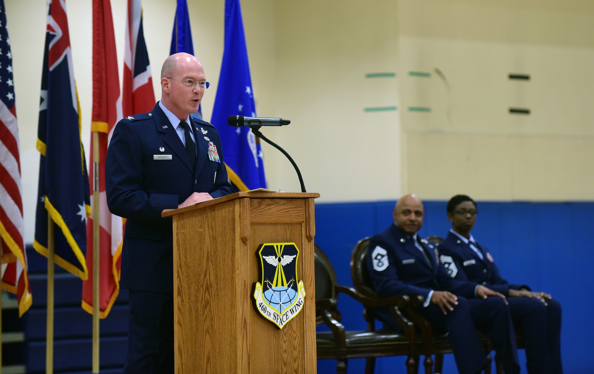 Col. Troy L. Endicott, 460th Space Wing commander, reflects on the early career of his former and current command chief and how their career developed to make them the leaders they are today during a change of responsibility ceremony on Buckley Air Force Base, Colorado, July 20, 2018.