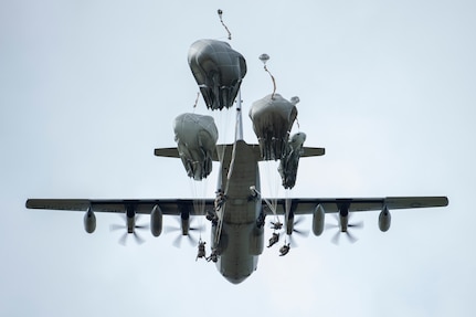 Paratroopers from U.S. Army Alaska’s 4th Infantry Brigade Combat Team (Airborne), 25th Infantry Division descend toward Malemute Drop Zone at Joint Base Elmendorf-Richardson, Alaska, July 17, 2018. More than 400 Soldiers parachuted as part of a field training exercise, executing tactical movements and setting up defensive positions while performing an airfield assault.