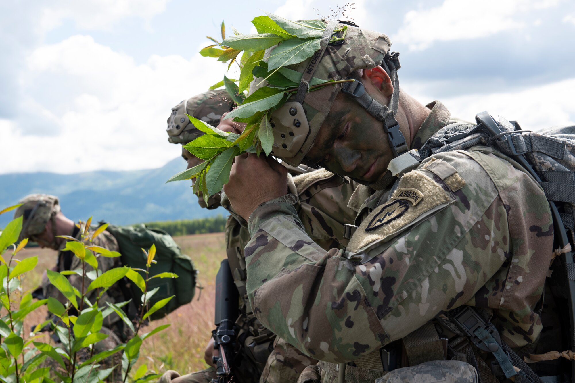Paratroopers from U.S. Army Alaska’s 4th Infantry Brigade Combat Team (Airborne), 25th Infantry Division descend toward Malemute Drop Zone at Joint Base Elmendorf-Richardson, Alaska, July 17, 2018. More than 400 Soldiers parachuted as part of a field training exercise, executing tactical movements and setting up defensive positions while performing an airfield assault.