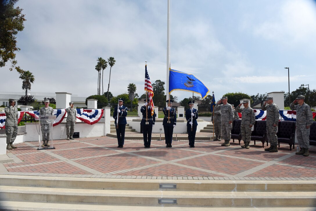 Vandenberg honor guardsmen present the colors during the 30th Launch Group deactivation ceremony on July 20, 2018, at Vandenberg Air Force Base, Calif. The 30th Space Wing inactivated the 30th LCG, merging their range responsibilities and personnel with the 30th OG. (U.S. Air Force photo by Tech. Sgt. Jim Araos/Released)