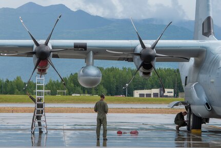 Marines of the 3d Transportation Support Battalion, VMGR-152, and Marine Wing Support Squadron 172 are participating in Exercise Kodiak Mace. During the exercise, through July 25, Marines are conducting joint precision air drop system, cargo, and personnel airdrops.