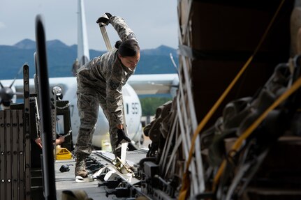 Marines of the 3d Transportation Support Battalion, VMGR-152, and Marine Wing Support Squadron 172 are participating in Exercise Kodiak Mace. During the exercise, through July 25, Marines are conducting joint precision air drop system, cargo, and personnel airdrops.
