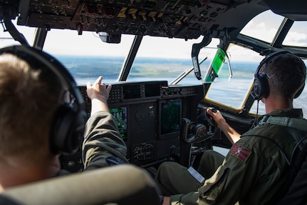 Marines of the 3d Transportation Support Battalion, VMGR-152, and Marine Wing Support Squadron 172 are participating in Exercise Kodiak Mace. During the exercise, through July 25, Marines are conducting joint precision air drop system, cargo, and personnel airdrops.
