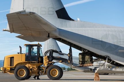 Marines of the 3d Transportation Support Battalion, VMGR-152, and Marine Wing Support Squadron 172 are participating in Exercise Kodiak Mace. During the exercise, through July 25, Marines are conducting joint precision air drop system, cargo, and personnel airdrops.