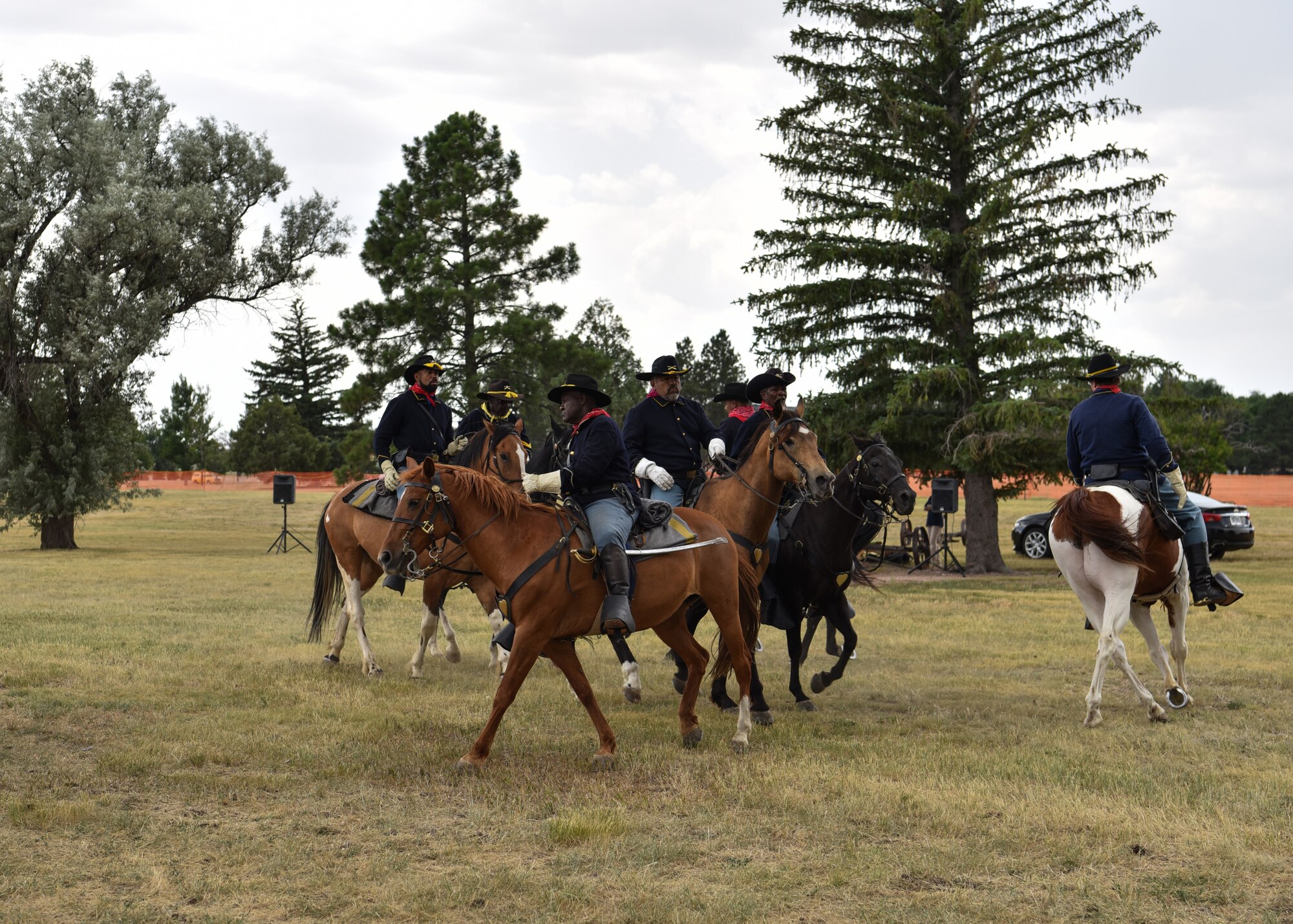 Members of a Buffalo soldier’s re-enactment riding team perform during Fort D.A. Russell Days on F.E. Warren Air Force Base, Wyo., July 21, 2018. The performance is a demonstration of historical cavalry precision riding drills. The annual open house invites the community and visitors to tour the base to learn about its history and its current ICBM deterrence mission. (U.S. Air Force photo by Airman 1st Class Braydon Williams)