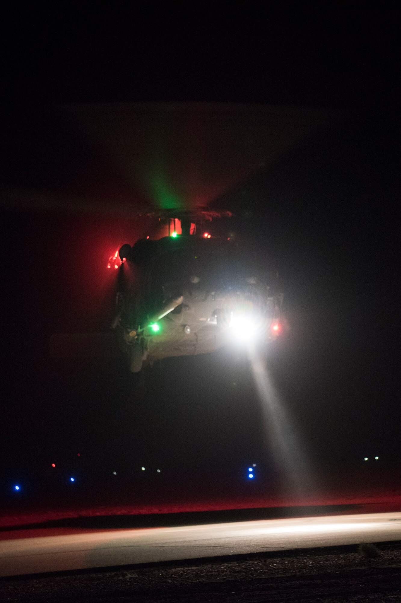 An HH-60 Pave Hawk takes off for a nighttime flight, July 4, 2018, at Al Asad Air Base, Iraq.