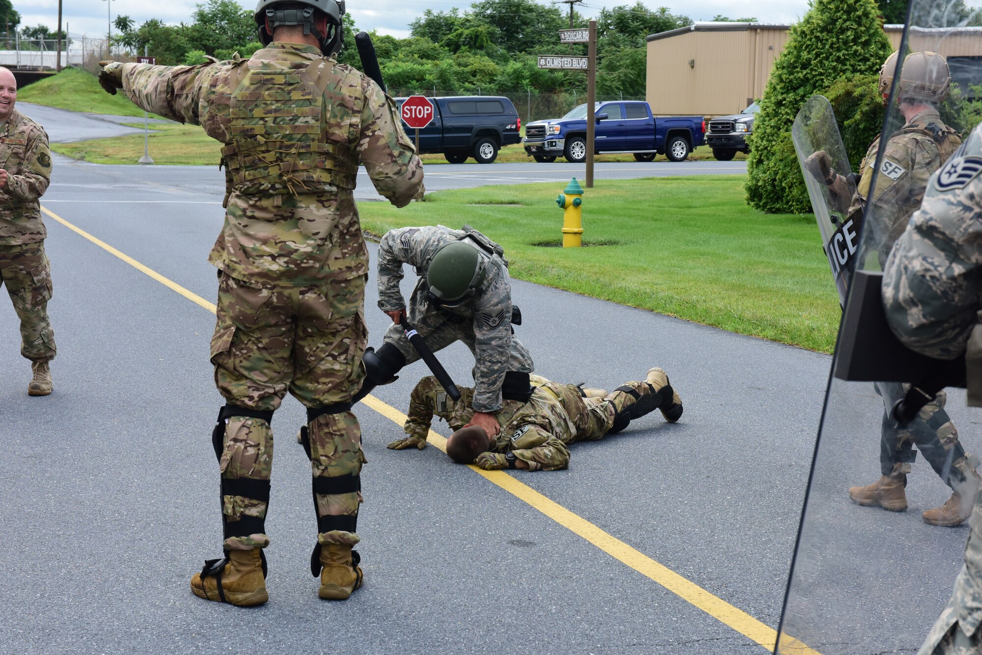 A security forces specialist from the 193rd Special Operations Security Forces Squadron, Middletown, Pennsylvania, Pennsylvania Air National Guard, conduct riot control countermeasures training July 22, 2018. The 193rd SOSFS Airmen participate in this two times a year as part of their required domestic operations training. (U.S. Air National Guard photo by Senior Airman Julia Sorber/Released)
