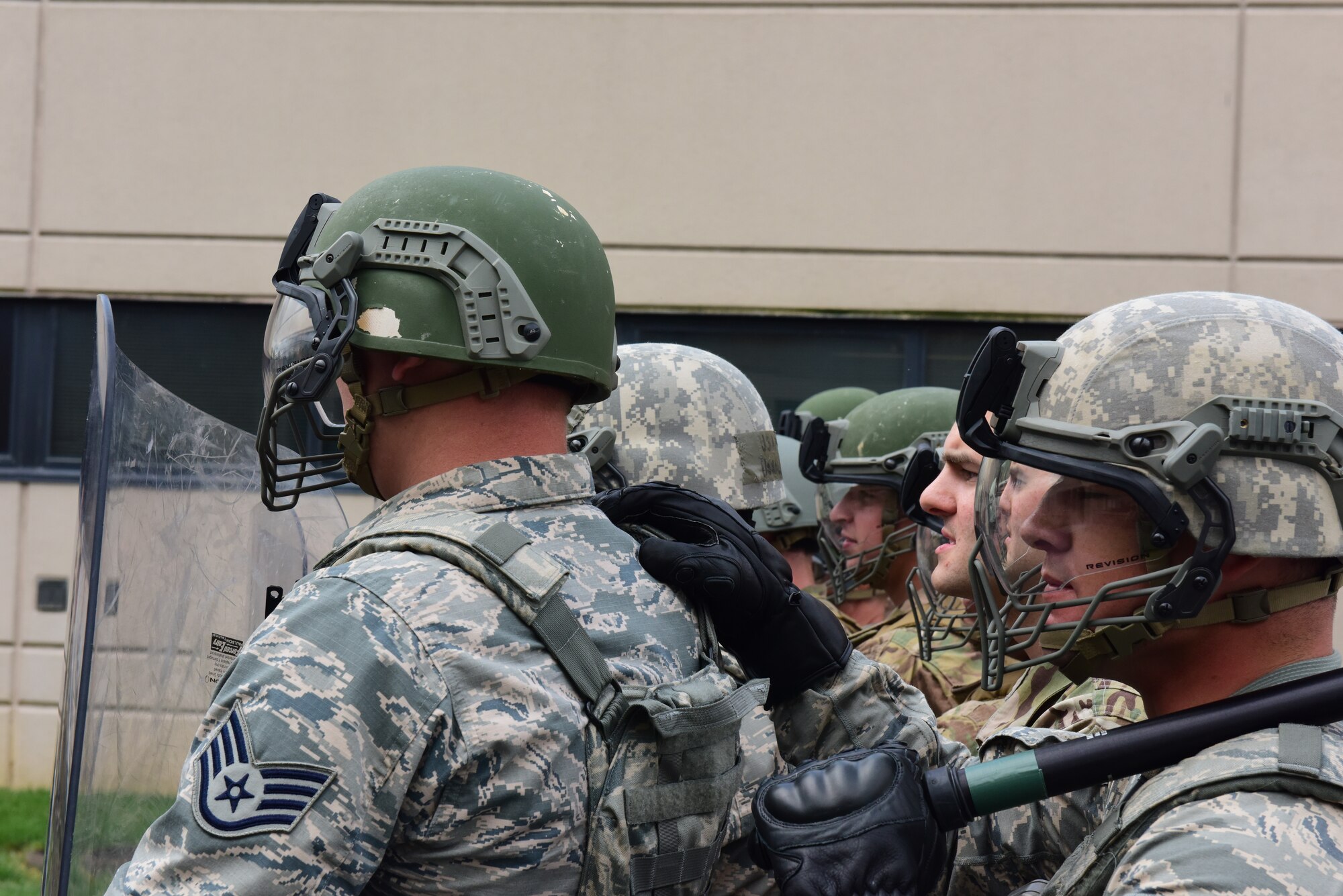 Security forces specialists from the 193rd Special Operations Security Forces Squadron, Middletown, Pennsylvania, Pennsylvania Air National Guard, conduct riot control countermeasures training July 22, 2018. The 193rd SOSFS Airmen participate in this two times a year as part of their required domestic operations training. (U.S. Air National Guard photo by Senior Airman Rachel Loftis/Released)