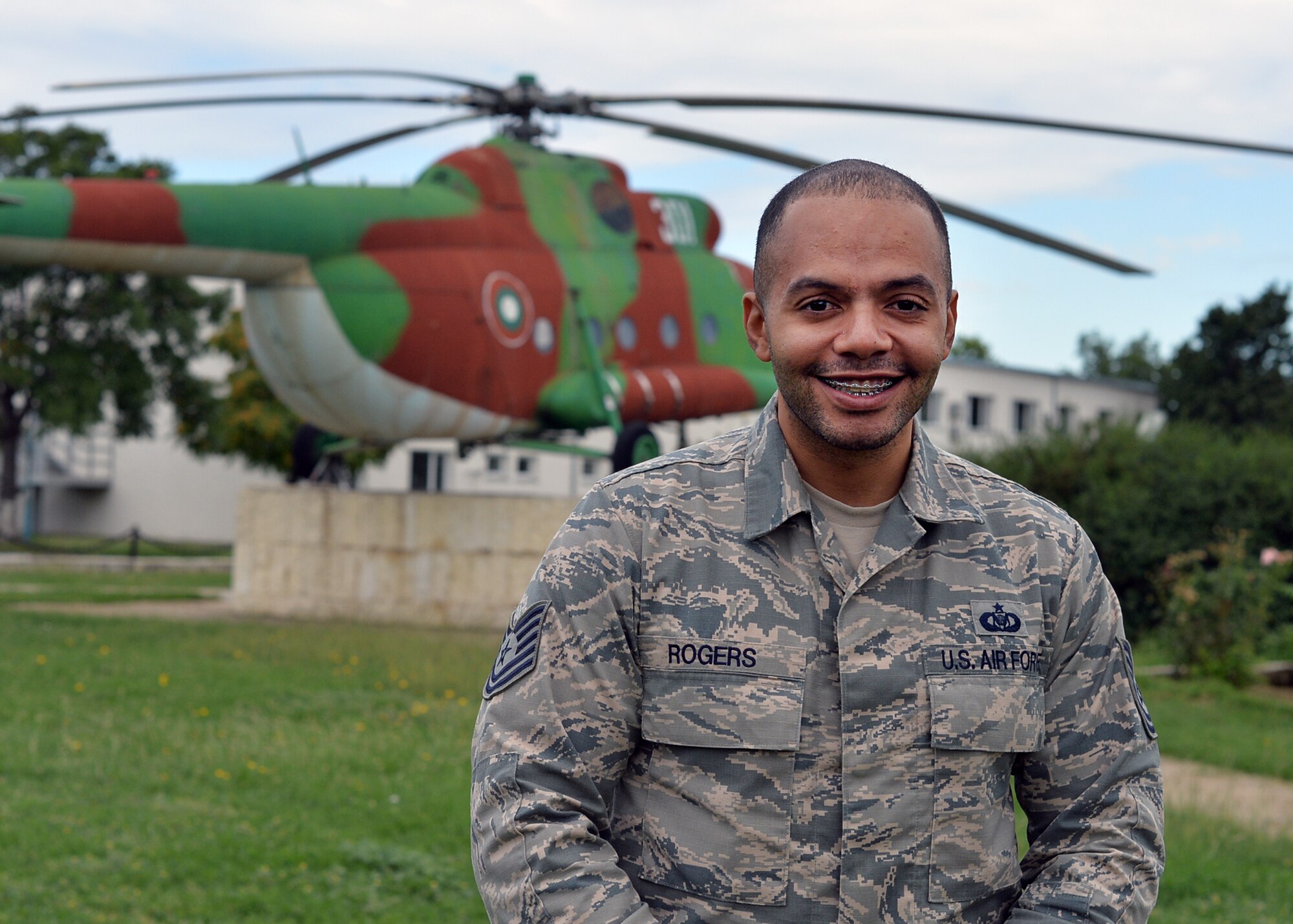 U.S. Air Force Tech. Sgt. Julius Rogers, 86th Operations Support Squadron aviation resource manager, poses for a photo in Plovdiv, Bulgaria, July 19, 2018. Rogers deployed with the 37th Airlift Squadron to support Thracian Summer 18, a bilateral exercise between the U.S. and Bulgaria. While deployed, Rogers ensured that aircrew members were fit to fly, and tracked their flight and training hours. (U.S. Air Force photo by Staff Sgt. Jimmie D. Pike)