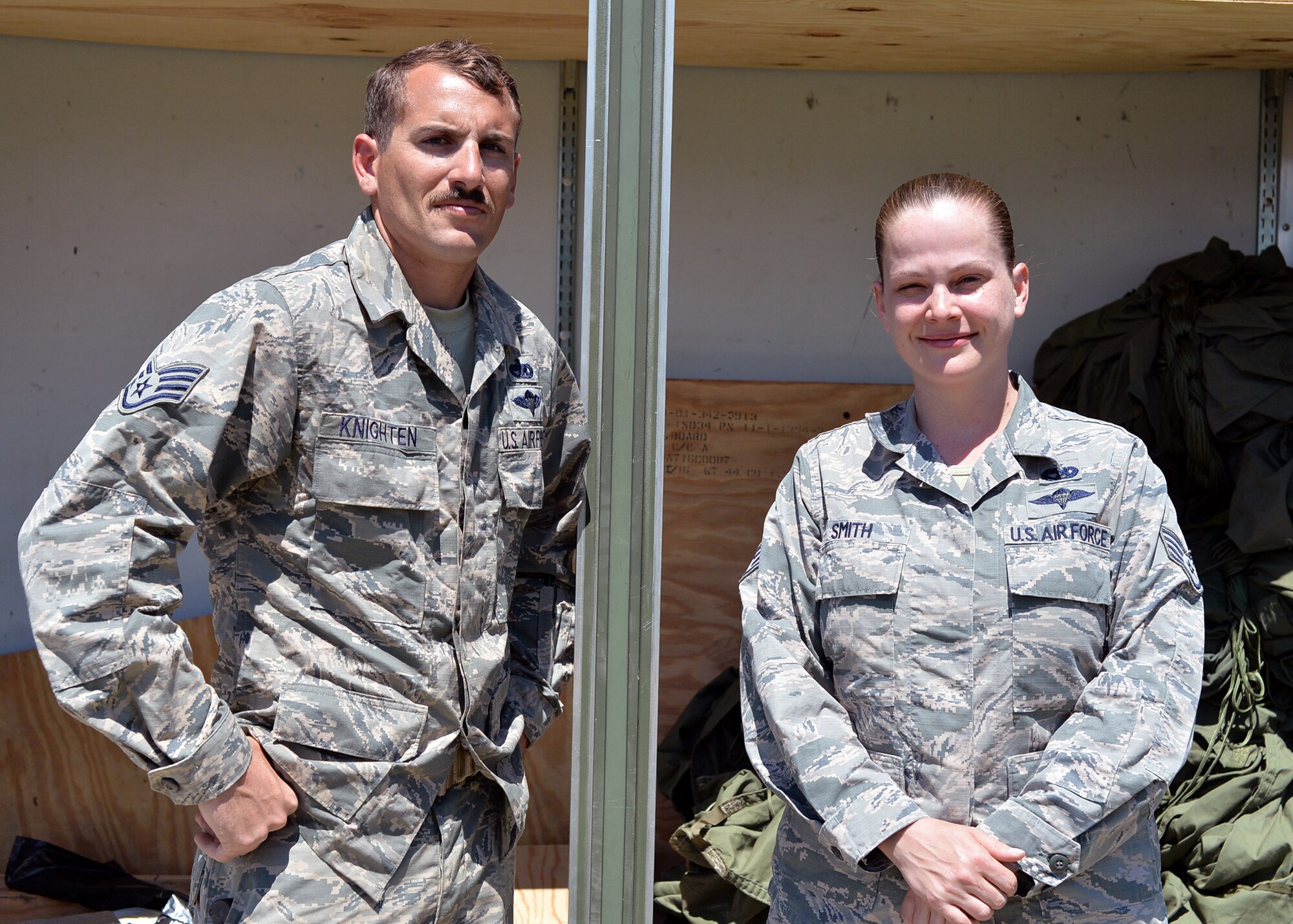 U.S. Air Force Staff Sgt. Justen Knighten and Staff Sgt. Jessica Smith, 86th Logistics Readiness Squadron aerial delivery supervisors, pose for a photo in Plovdiv, Bulgaria, July 19, 2018. Knighten and Smith supported Thracian Summer 18 by configuring pallets to be used in airdrop training missions to maintain qualifications for 37th Airlift Squadron aircrew members. Thracian Summer is a bilateral exercise between the U.S. and Bulgaria. (U.S. Air Force photo by Staff Sgt. Jimmie D. Pike)
