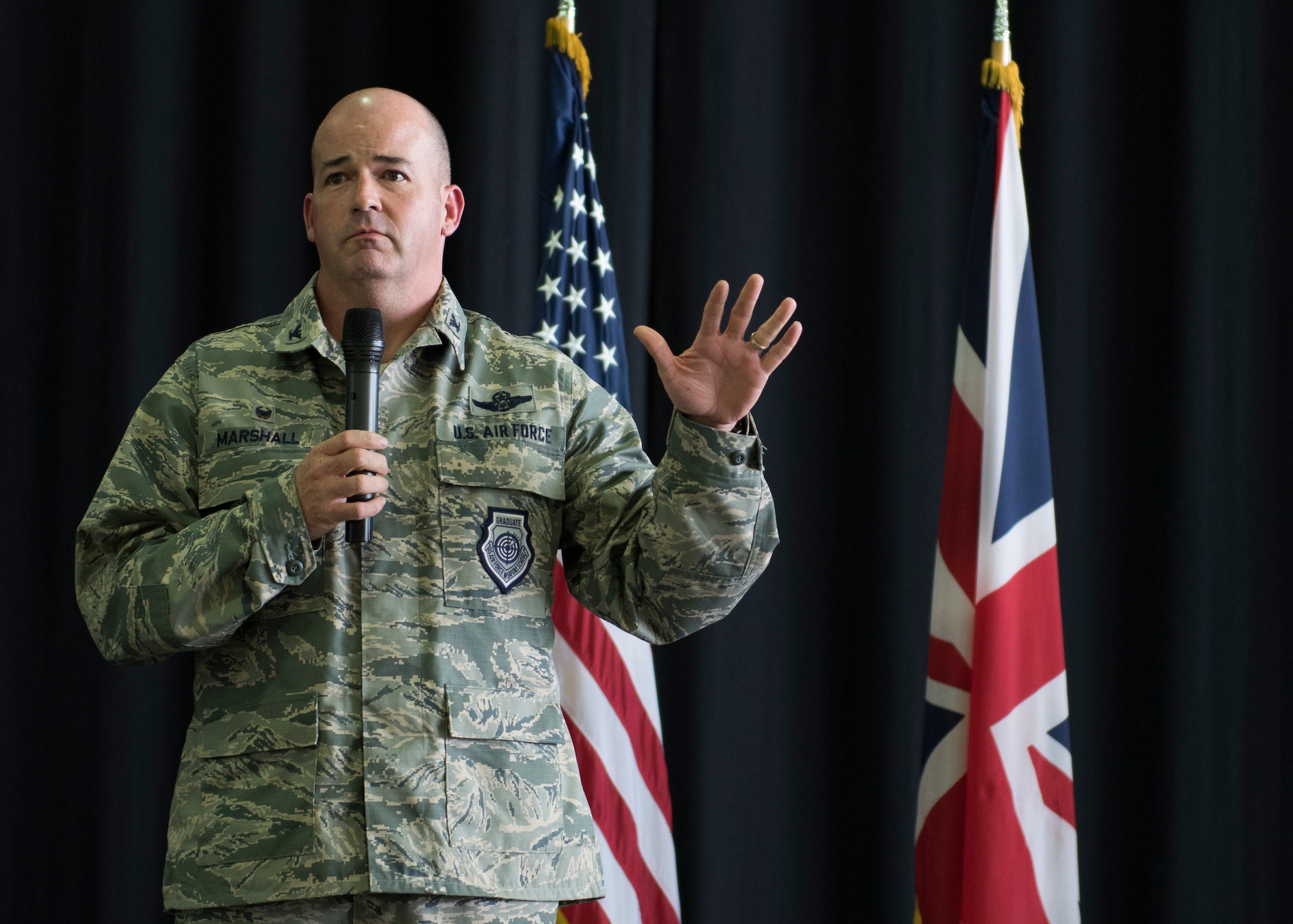 U.S. Air Force Col. William Marshall, 48th Fighter Wing commander, speaks to Liberty Wing Airmen during an All Call at Royal Air Force Lakenheath, England, July 20, 2018. Marshall assumed command of the 48th FW July 16, 2018. (U.S. Air Force photo/ Senior Airman Malcolm Mayfield)