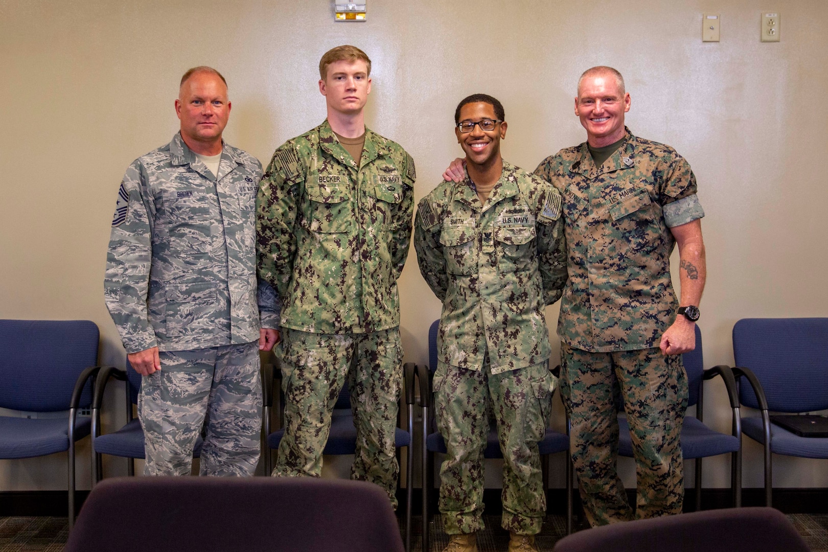 Marine Sgt. Maj. Paul McKenna, Command Senior Enlisted Leader, North American Aerospace Defense Command (NORAD) and United States Northern Command (NORTHCOM) and CMSgt James Brown, Command Senior Enlisted Leader, Joint Task Force Civil Support (JTF-CS), posed with newly promoted Logistics Specialist 1st Class Vincent Smith and Hospital Corpsman 2nd Class Casey Becker July 13 for a group photo. McKenna visited JTF-CS for a tour of the headquarters of the nation’s only standing chemical, biological, radiological or nuclear response force. When directed, JTF-CS is ready to respond in 24 hours to provide command and control of 5,200 federal military forces located at more than 36 locations throughout the nation acting in support of civil authority response operations to save lives, prevent further injury, and provide critical support to enable community recover. (Official DoD photo by Mass Communication Specialist 3rd Class Michael Redd/released)