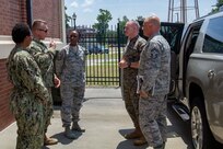 Marine Sgt. Maj. Paul McKenna, Command Senior Enlisted Leader, North American Aerospace Defense Command (NORAD) and United States Northern Command (NORTHCOM), is briefed by members of Joint Task Force Civil Support (JTF-CS) July 13 on the communication capabilities of the command. McKenna visited JTF-CS for a tour of the headquarters of the nation’s only standing chemical, biological, radiological or nuclear response force. When directed, JTF-CS is ready to respond in 24 hours to provide command and control of 5,200 federal military forces located at more than 36 locations throughout the nation acting in support of civil authority response operations to save lives, prevent further injury, and provide critical support to enable community recover. (Official DoD photo by Mass Communication Specialist 3rd Class Michael Redd/released)