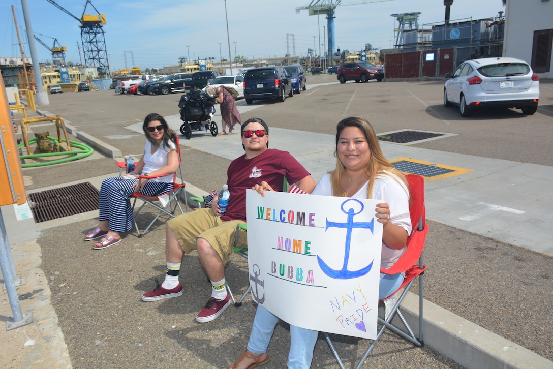 Family members await the return of the hospital ship USNS Mercy to San Diego following its five-month deployment to Southeast Asia in support of Pacific Partnership 2018, July 21, 2018. Navy photo by Sarah Burford