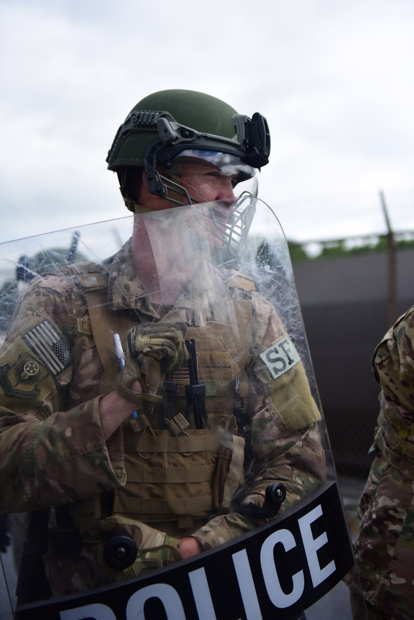 A security forces specialist from the 193rd Special Operations Security Forces Squadron, Middletown, Pennsylvania, Pennsylvania Air National Guard, conduct riot control countermeasures July 22, 2018. The 193rd SOSFS Airmen participate in this two times a year as part of their required domestic operations training. (U.S. Air National Guard photo by Senior Airman Julia Sorber/Released)