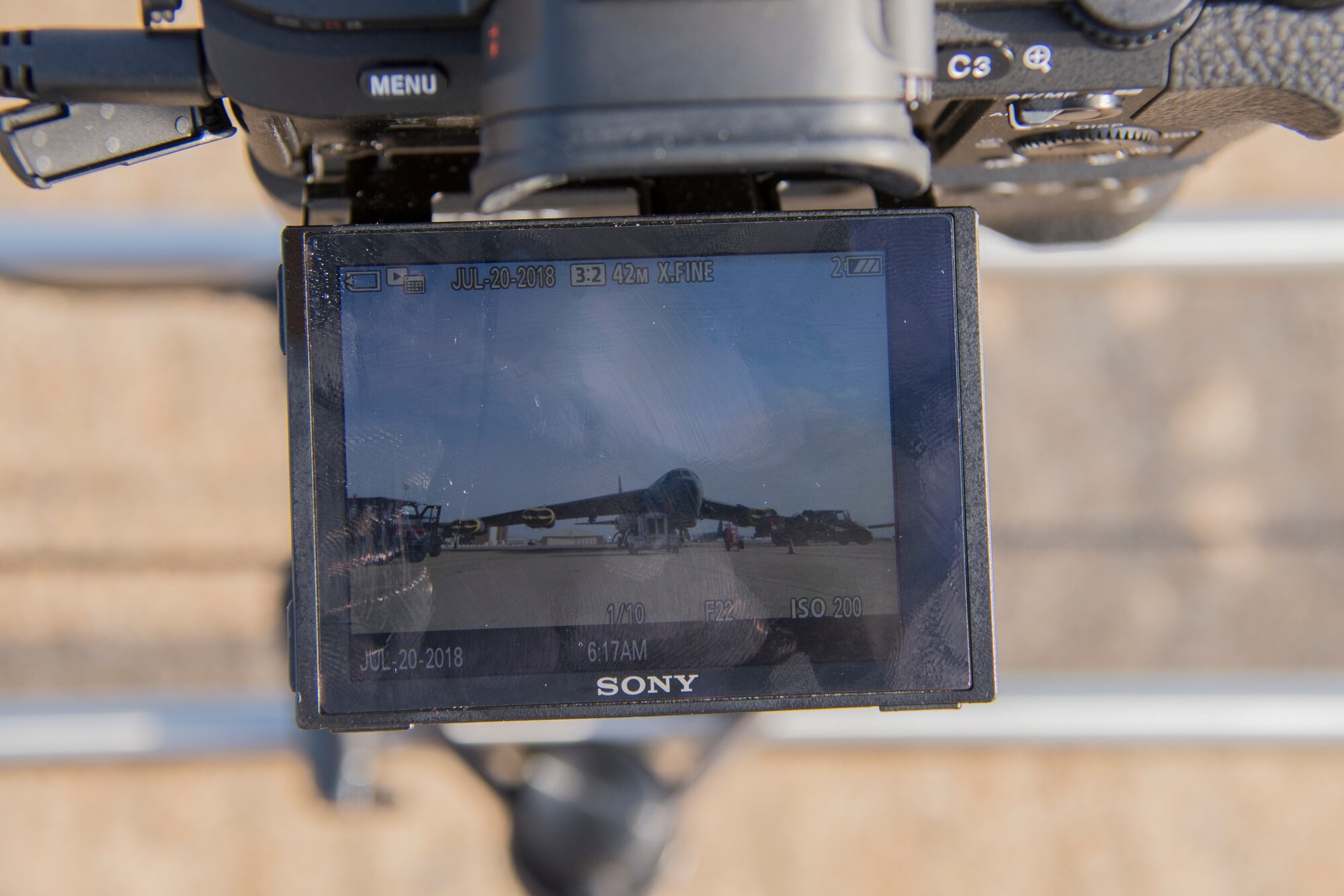 A camera displays a B-52 Stratofortress at Barksdale Air Force Base, Louisiana, July 20, 2018. The camera belongs to advance media specialists from the Raytheon Company. The company is utilizing the B-52 to test their MALD-X missile with help from the 307th Aircraft Maintenance Squadron. (U.S. Air Force photo by Airman Maxwell Daigle/Released)