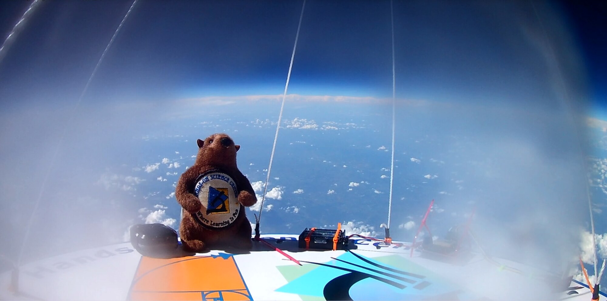 Tully the plush groundhog gets a view of Earth after entering the stratosphere. The stuffed animal was attached to a high altitude balloon launched on June 19 as part of the Hands-On Science Center Air Force STEM Summer Camp. (Courtesy photo)