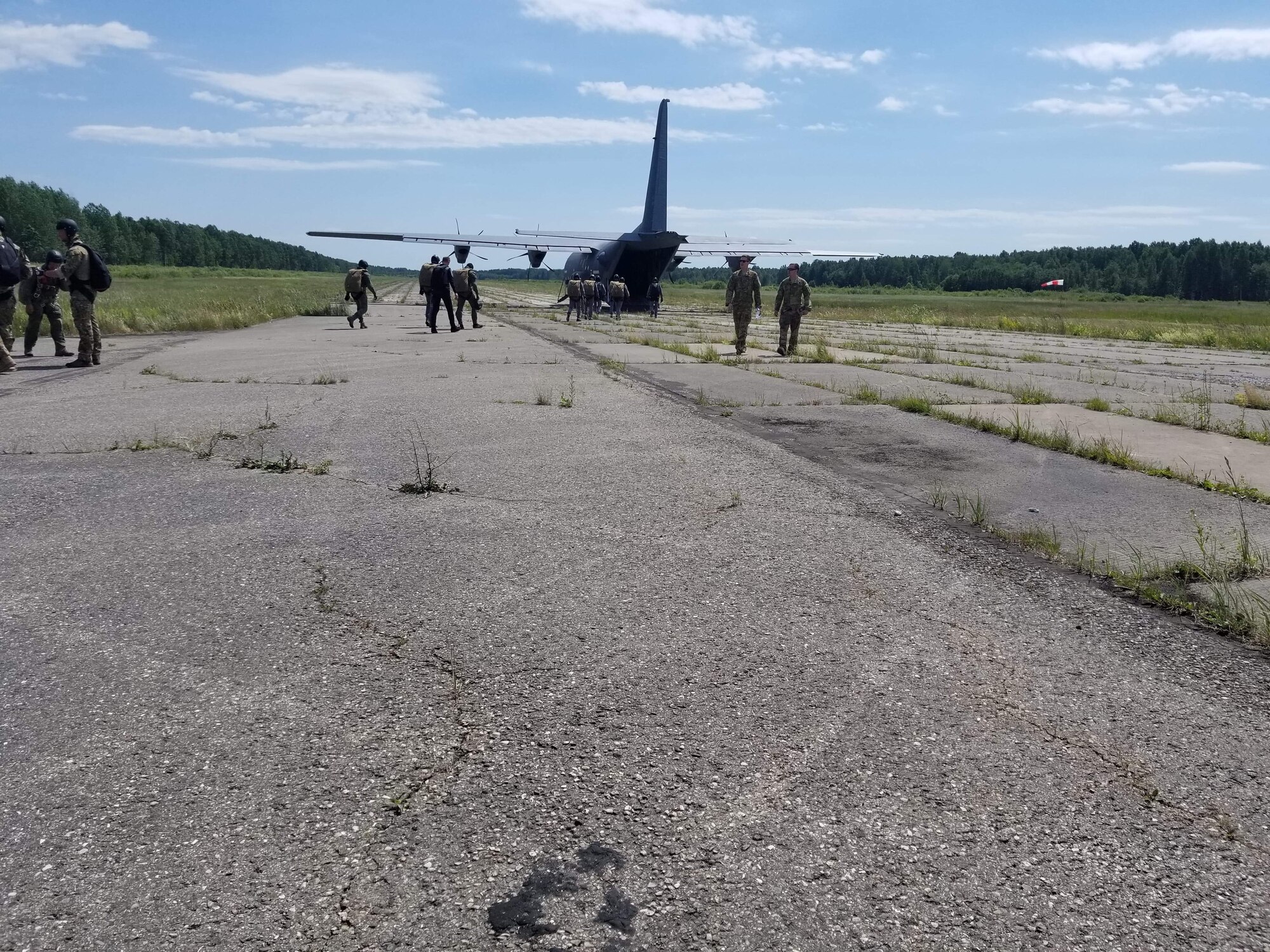 193rd Special Operations Wing Airmen pose for a photo during multinational exercises outside of the continental United States. These exercises were Trojan Footprint and Flaming Sword and occurred from May 15 - June 15, 2018. (U.S. Air National Guard courtesy photo/released.)