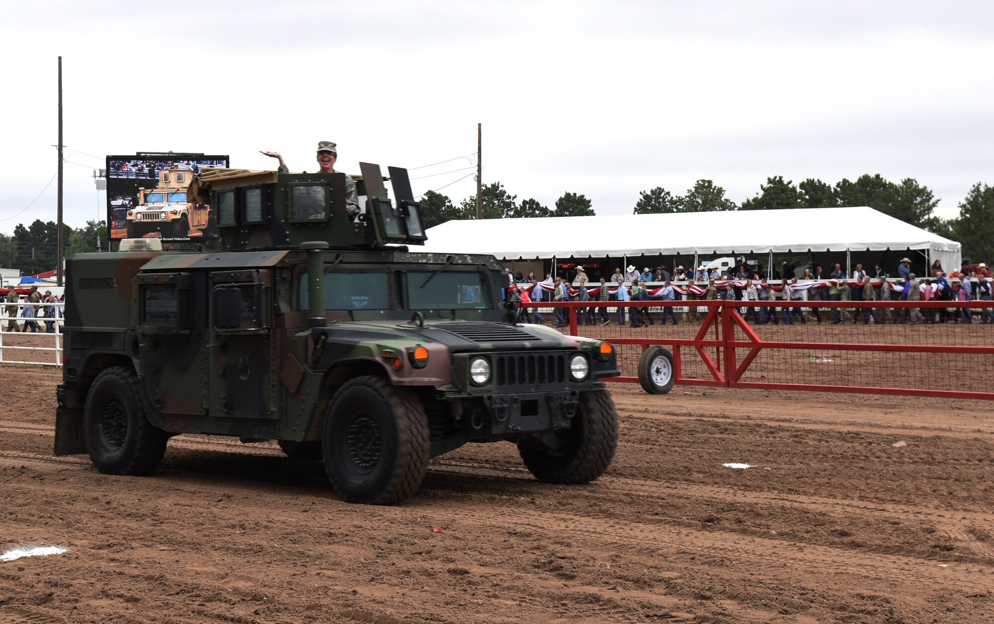 Col. Stacy Jo Huser, 90th Missile Wing commander, greets the crowd at Cheyenne Frontier Day’s Military Monday event in Cheyenne, Wyo., July 23, 2018. Leadership from local military installations including F.E. Warren Air Force Base were invited to be a part of the Military Monday festivities. The F.E. Warren Air Force Base and Cheyenne communities came together to celebrate the CFD rodeo and festival, which runs from July 20-29. (U.S. Air Force photo by Senior Airman Breanna Carter)