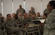 Airmen and our international partners listen to Master Sgt. Tonya Poole, 613th Air Operations Center, 56th Air Communications Squadron first sergeant, as she speaks about domestic violence and how to handle a situation, during the 2018 Team Hickam First Sergeant Symposium, on Joint Base Pearl Harbor-Hickam, Hawaii, July 17, 2018. Our international partners have been attending the symposium for four years, knowing they would be able to add a unique perspective and valuable insight to the role of first sergeants. (U.S. Air Force photo by Staff Sgt. Hailey Haux)