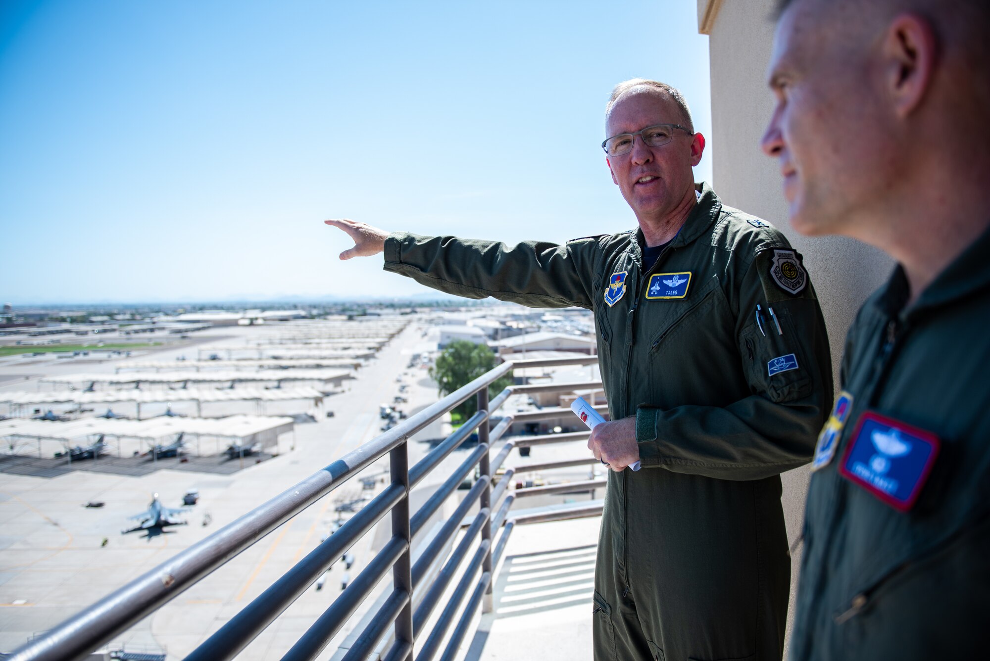 U.S. Air Force Brig. Gen. Todd Canterbury, 56th Fighter Wing commander, speaks to U.S. Air Force Lt. Gen. Steve Kwast, commander of Air Education and Training Command during his visit to Luke Air Force Base, Ariz., July 20, 2018. During his visit, Kwast visited various units on base to gain insight on current operations and provide ideas for development. (U.S. Air Force photo by Airman 1st Class Alexander Cook)