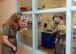 Mrs. Joni Kwast, spouse of Lt. Gen. Steve Kwast, commander of Air Education and Training Command, waves at a baby in the Child Development Center during a base tour at Luke Air Force Base, Ariz., July 20, 2018. General and Mrs. Kwast visited to gain a greater insight into the 56th Fighter Wing mission and engage with the civic leaders that support Luke AFB. (U.S. Air Force photo by Staff Sgt. Franklin R. Ramos)