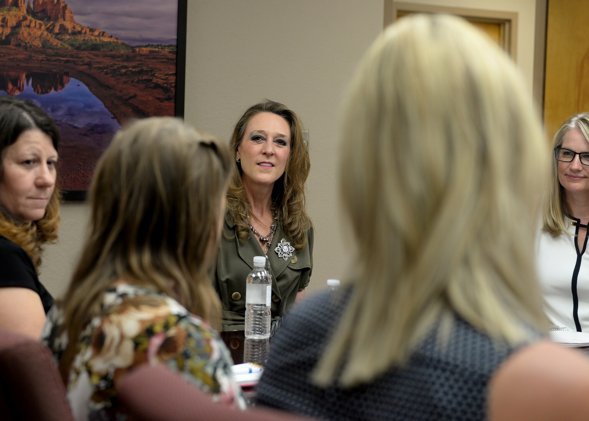 Mrs. Joni Kwast, spouse of U.S. Air Force Lt. Gen. Steve Kwast, commander of Air Education and Training Command, speaks with local key spouses, during a visit at Luke Air Force Base, Ariz., July 20, 2018. Mrs. Kwast spoke with key spouses to gain insight about operations and support services that impact the families at Luke AFB. (U.S. Air Force photo by Staff Sgt. Franklin R. Ramos)