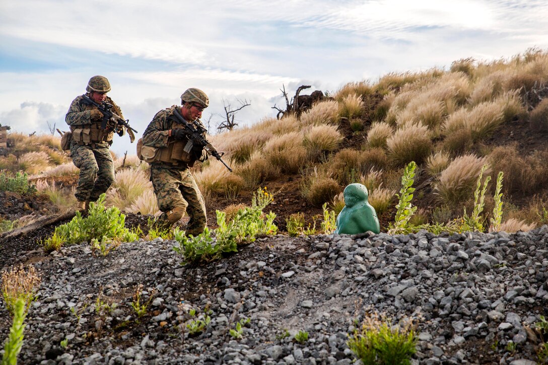 Marines secure an enemy position during a live-fire training event.