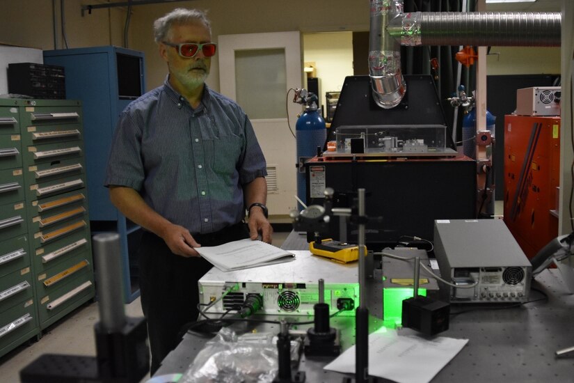 AEDC Hypervelocity Tunnel 9 Advanced Diagnostician and physicist Michael Smith works in the Tunnel 9 Laser Lab. Recently-developed advanced laser diagnostics are helping pave the way for a Mach 18 capability at Tunnel 9, an AEDC facility located in White Oak, Maryland. (U.S. Air Force Photo)