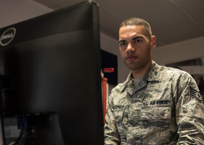 INCIRLIK AIR BASE, Turkey – U.S. Air Force Staff Sgt. Bryant Lopez-Cepero, 728th Air Mobility Squadron unit training manager, works at his computer at Incirlik Air Base, Turkey, July 5, 2018.