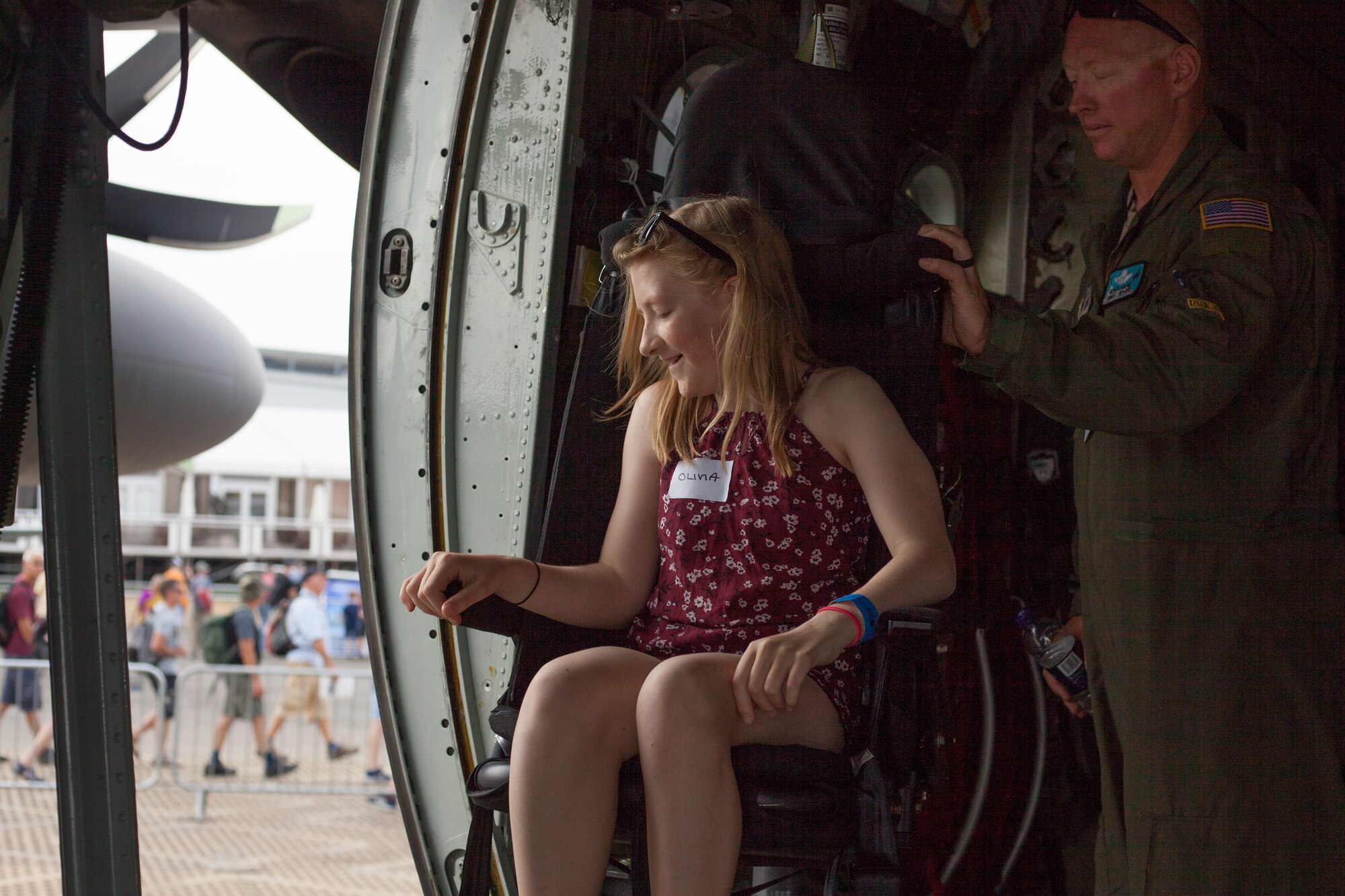United States military personnel give aircraft tours to children at the Farnborough International Airshow, July 21, 2018 at Farnborough, United Kingdom. Over the weekend, FIA opened up to the general public to demonstrate the latest in military and civilian aircraft capabilities. Farnborough organizers, in conjunction with the Barrie Wells Trust, gave disabled children access to explore various U.S. Air Force and U.S. Army aircraft (U.S. Air Force photo by Capt. Allie Delury)