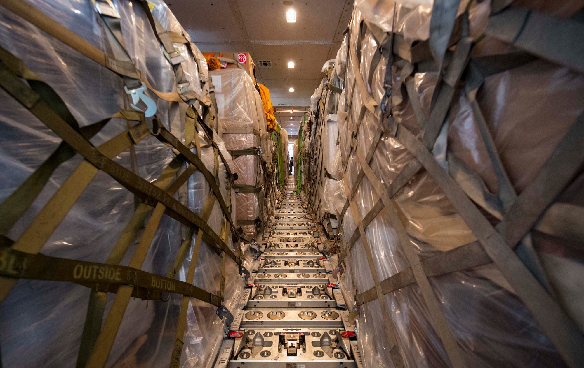 Cargo sits on a Boeing 747 aircraft on Ramstein Air Base, Germany, July 18, 2018. The 721st Aerial Port Squadron serves Air Mobility Command's mission by handling the cargo and passengers that pass in and out of Ramstein. The cargo and passengers, such as mail, supplies, and deploying personnel, support missions across U.S. Central, Europe, and Africa Commands. (U.S. Air Force photo by Senior Airman Elizabeth Baker)