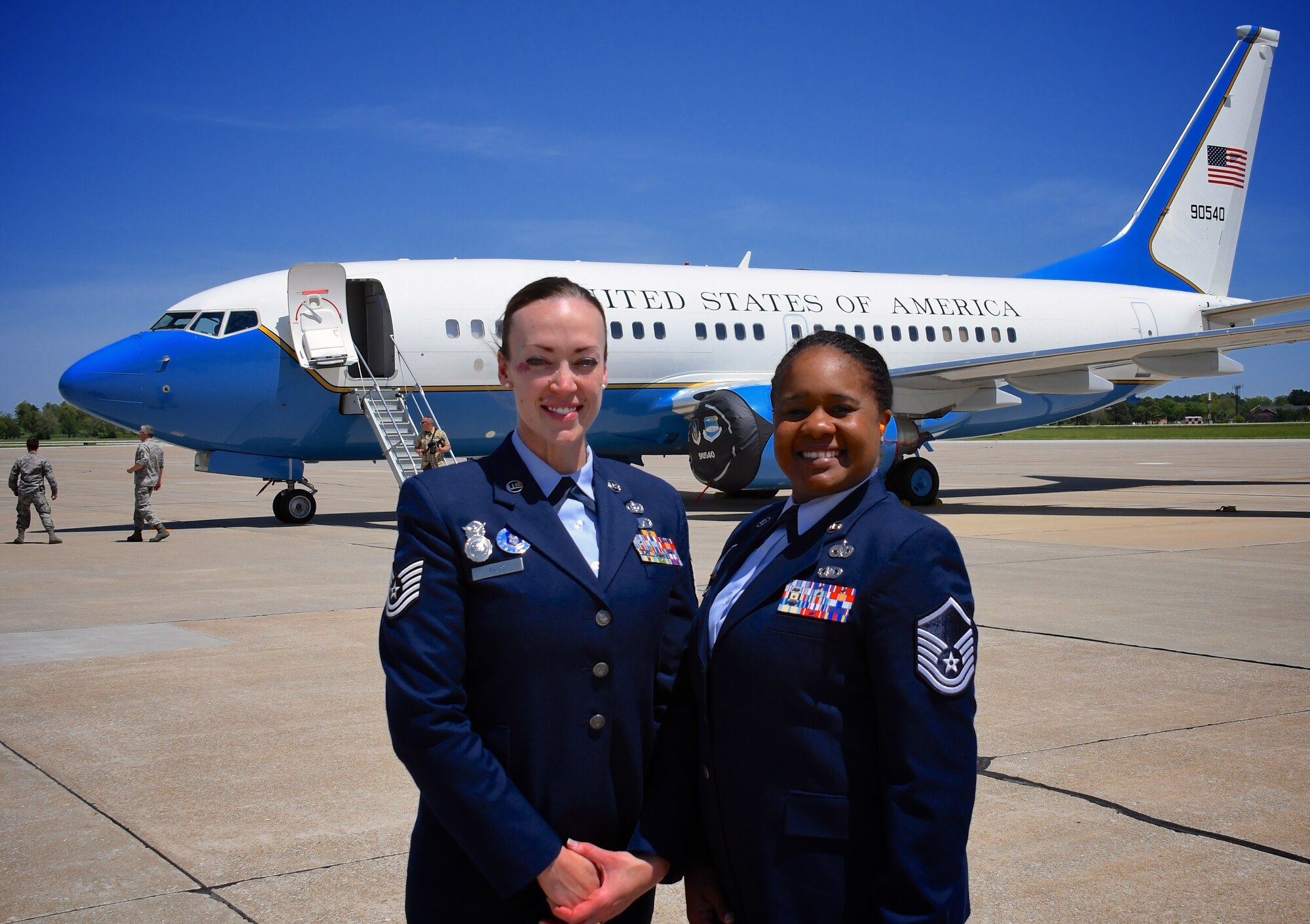 The recruiters at the 932nd Airlift Wing help to fill vacancies in various wing jobs that support the flying mission, including maintainers and operations aircrew personnel.  Seen here in front of the C-40C aircraft are Tech Sgt. Brittany Paus and Master Sgt. Dawn Williams, who visited the aircraft recently at Scott Air Force Base, Ill.  They are part of a team of recruiters who provide counseling handling phone calls, enlistment paperwork, questions, and guidance.  Paus is a United States Air Force Reserve Line Recruiter at the 932nd AW and Williams recruits medical people from the Saint Louis and Illinois region into the Air Force Reserve by day, and also coaches the 932nd Airlift Wing's volunteer volleyball team.  The 932nd Airlift Wing is a 22nd Air Force unit located near Saint Louis on the Illinois side of the Mississippi River. (U.S. Air Force photo by Lt. Col. Stan Paregien)