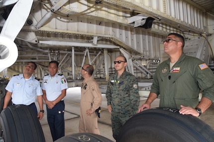 Master Sgt. Jesse Gonzalez, 356th Airlift Squadron flight engineer, discusses the C-5M Super Galaxy hydraulics system during a class tour from the Inter-American Air Forces Academy July 18 at Joint Base San Antonio-Lackland. The students in this photo are maintenance squadron officers in their respective countries’ air forces from Latin America.