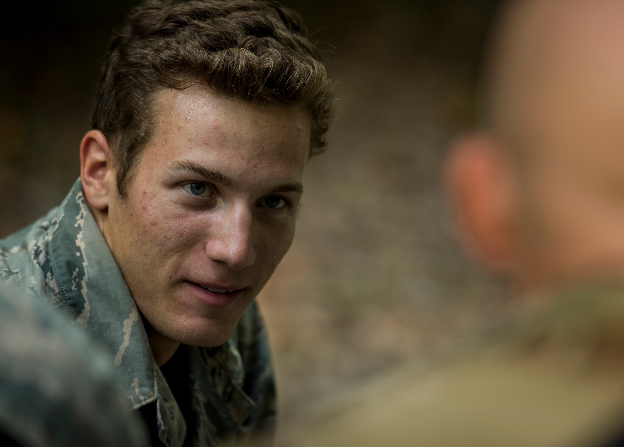 U.S. Air Force Airman 1st Class Jacob Brown, 633rd Civil Engineer Squadron water fuels apprentice, practices individual movement techniques during Prime Base Engineer Emergency Force training at Joint Base Langley-Eustis, Virginia, July 19, 2018.