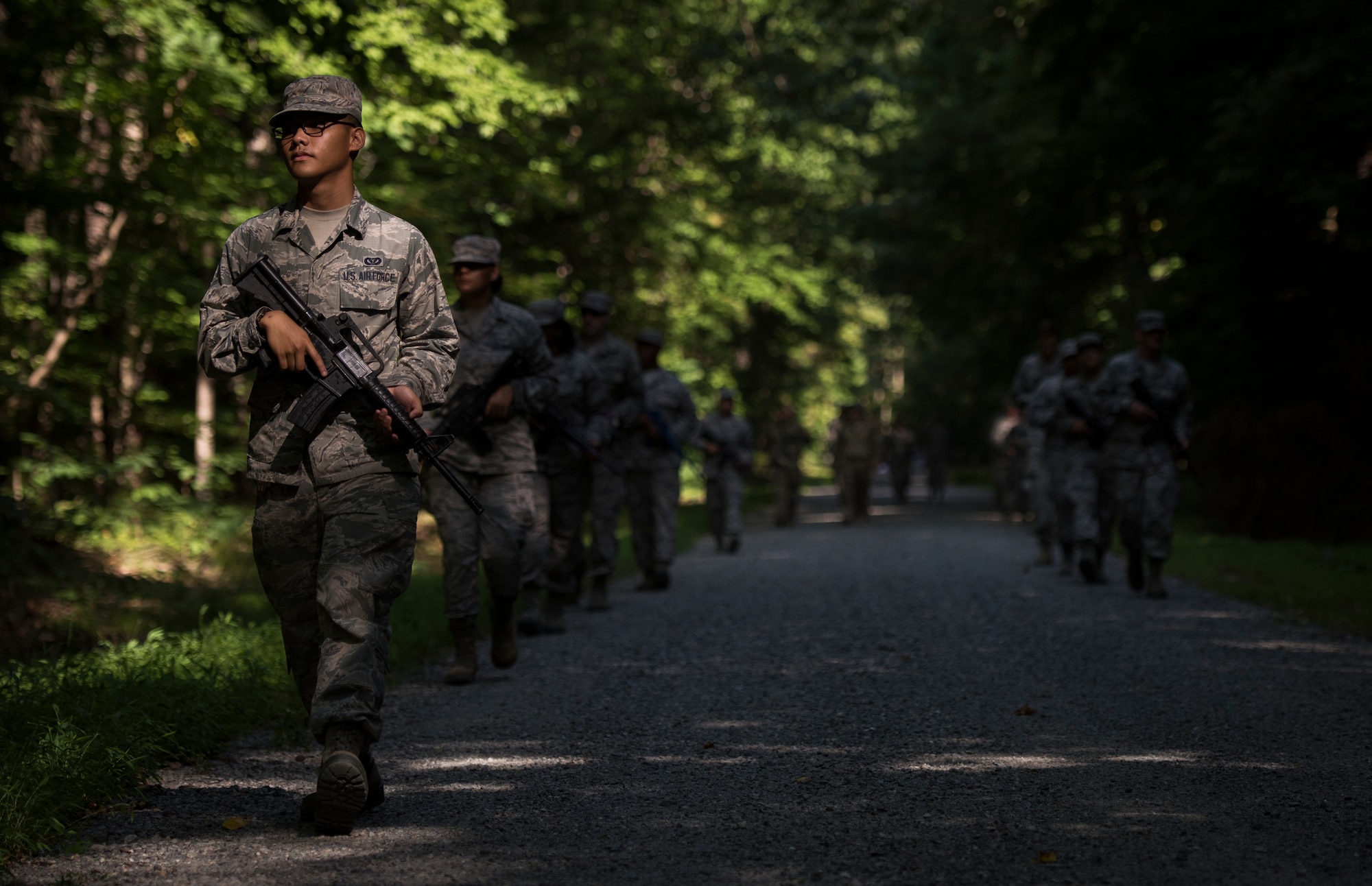 U.S. Air Force Airmen assigned to the 633rd Civil Engineer Squadron practice individual movement techniques during Prime Base Engineer Emergency Force training at Joint Base Langley-Eustis, Virginia, July 19, 2018.