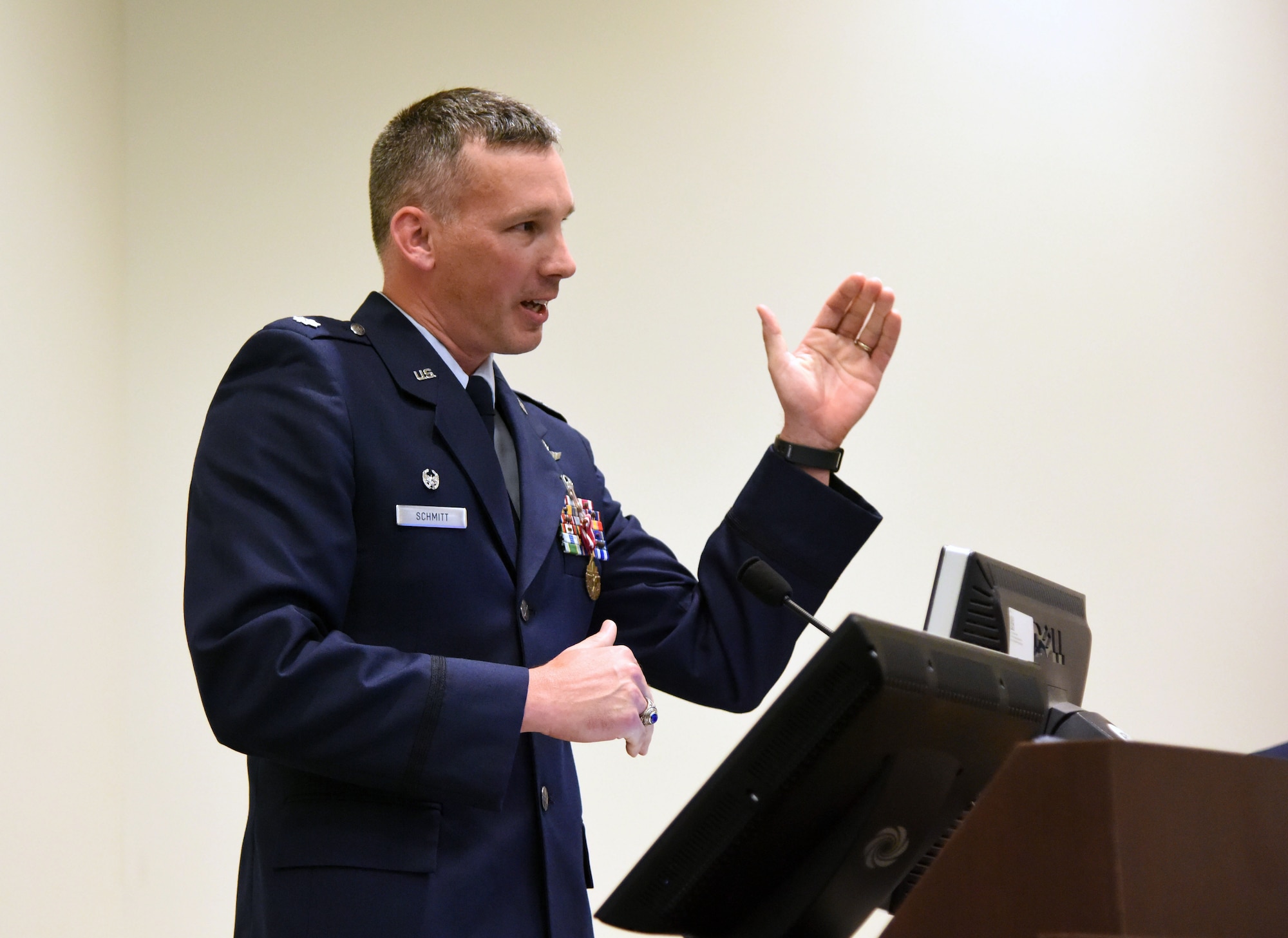 U.S. Air Force Lt. Col. Daniel Schmitt, outgoing 336th Training Squadron commander, delivers remarks during the 336th TRS change of command ceremony in the Roberts Consolidated Aircraft Maintenance Facility at Keesler Air Force Base, Mississippi, July 23, 2018. Schmitt relinquished command to Maj. Jill Heliker, incoming 336th TRS commander. (U.S. Air Force photo by Kemberly Groue)
