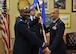 Capt. Gregory Stafford, right, accepts command of the 50th Space Communications Squadron Detachment 1 from Lt. Col. Anthony Lang, 50th SCS commander, during an assumption of command ceremony July 24, 2018, at the Grizzly Bend at Malmstrom AFB, Mont. Guidon bearer Master Sgt. Chad McManus, 50th SCS Det. 1 acting first sergeant, looks on. (U.S. Air Force photo by John Turner)