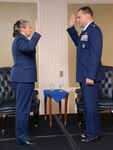 Brig. Gen. Hurry administers oat of office to Col.  Malec