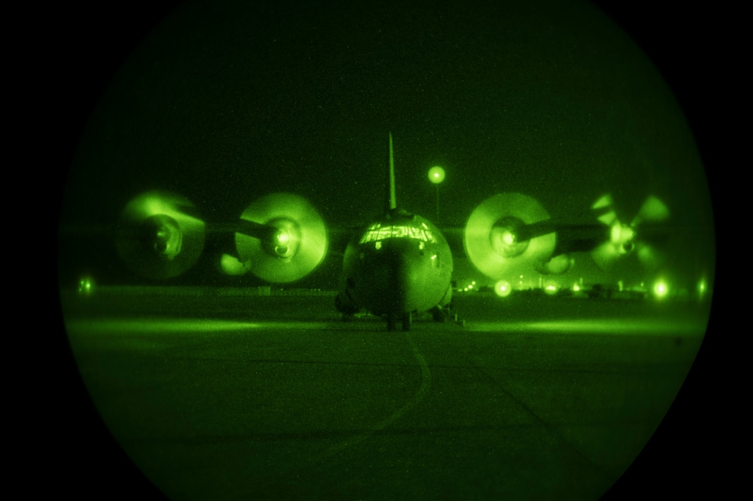 A U.S. Air Force C-130H Hercules assigned to the 746th Expeditionary Airlift Squadron at Al Udeid Air Base, Qatar, prepares to taxi down the runway.