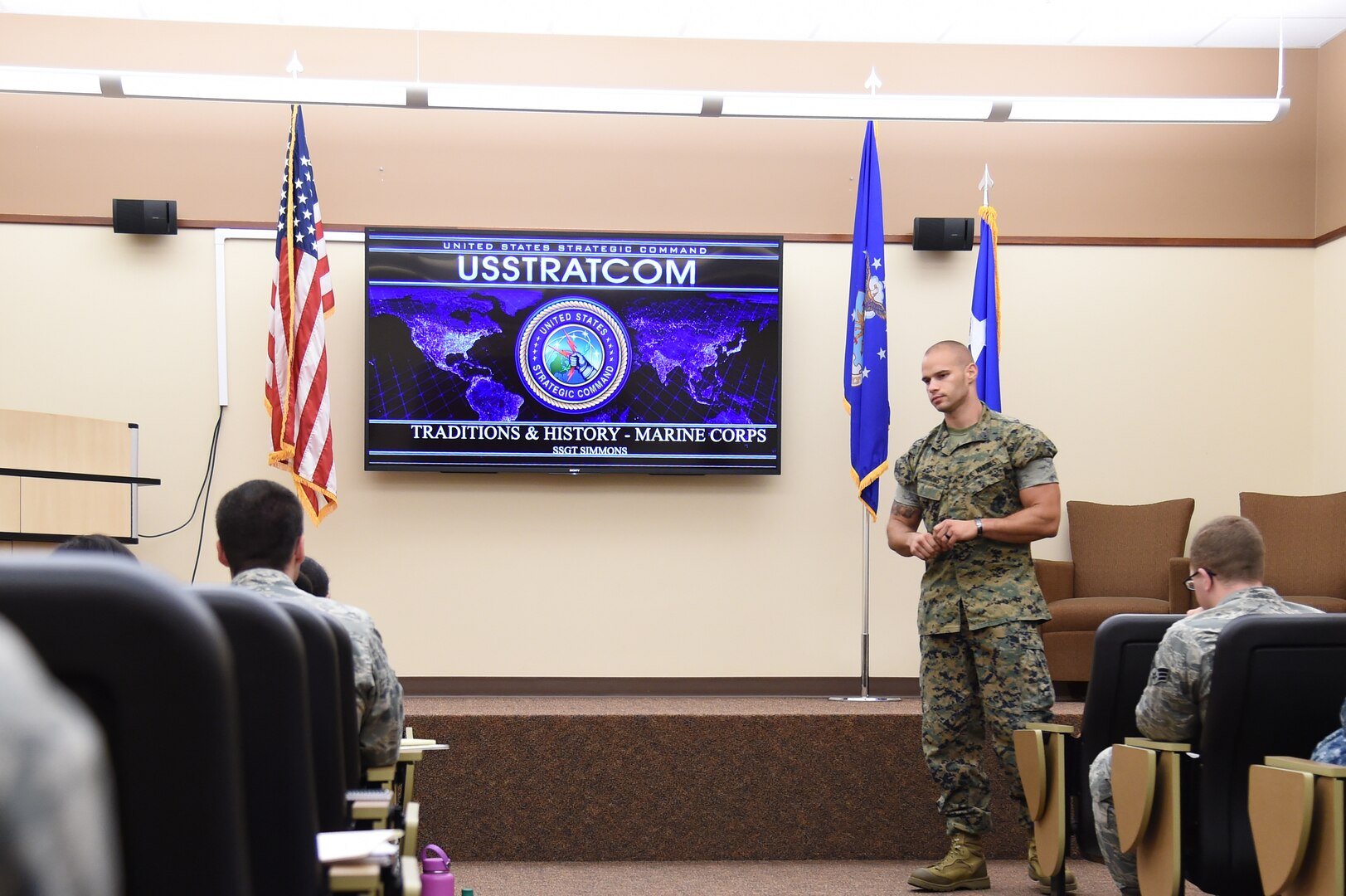 U.S. Marine Corps Staff Sgt. Jacob Simmons, U.S. Strategic Command (USSTRATCOM) Global Operations Center warning systems controller, teaches Offutt Air Force Base, Neb., junior-enlisted military members about U.S. Marine Corps traditions and history during the inaugural Junior Enlisted Professional Development Seminar, July 19, 2018. During the seminar, junior-enlisted members discussed a variety of topics with USSTRATCOM non-commissioned officers, petty officers and senior leaders. Topics included leadership, junior-enlisted roles and responsibilities, mentoring, military traditions and history, educational benefits, and customs and courtesies. USSTRATCOM has global responsibilities assigned through the Unified Command Plan that include strategic deterrence, nuclear operations, space operations, joint electromagnetic spectrum operations, global strike, missile defense, and analysis and targeting.